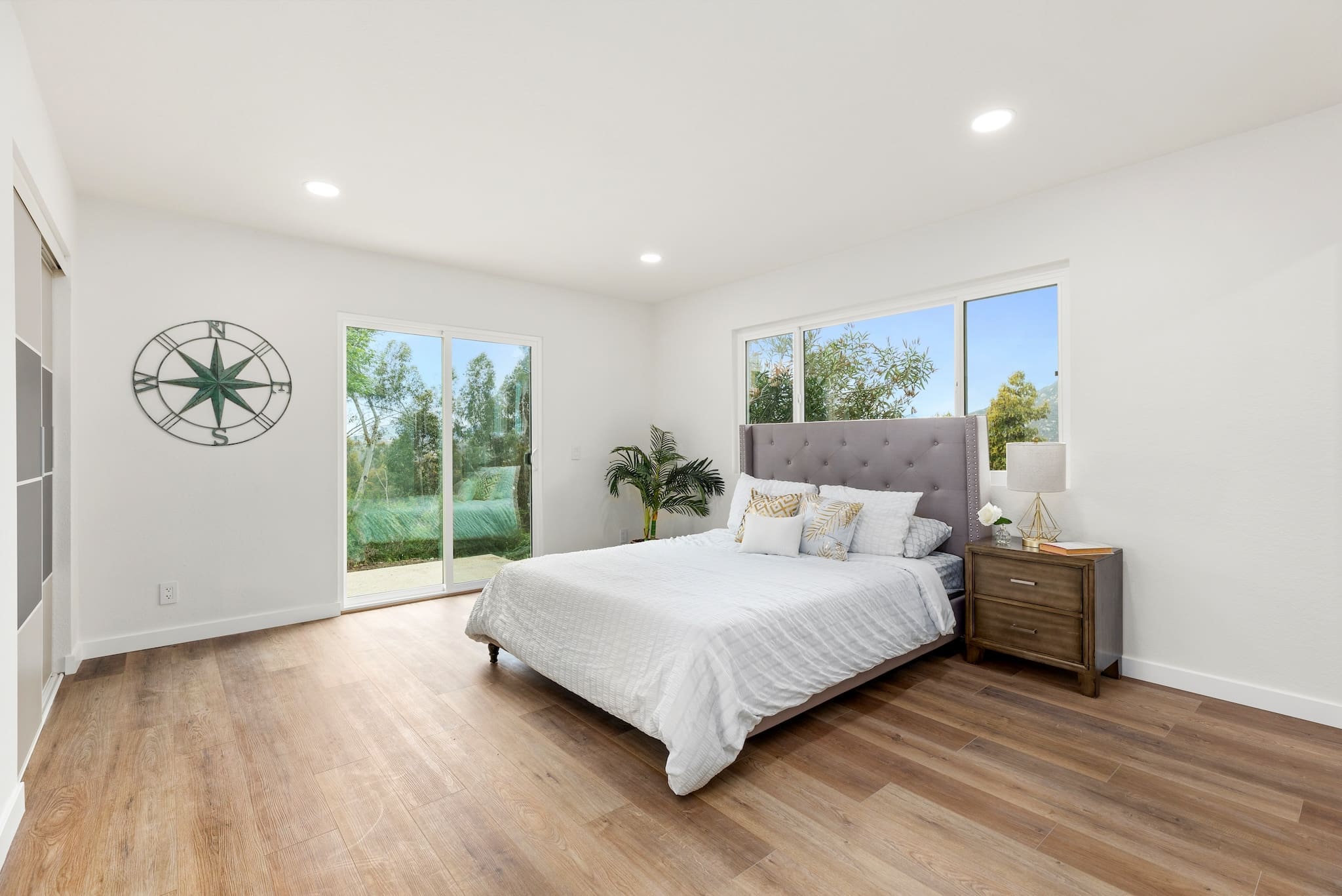 Modern ADU construction in San Diego with a stylish backyard.   Custom-built accessory dwelling unit (ADU) with energy-efficient design.   San Diego ADU builders working on a detached guest house.   Luxury home remodeling project in San Diego featuring a modern kitchen.   San Diego home renovation with upgraded interiors and open floor plan.   Bathroom remodel in San Diego with sleek tile and custom vanity.   New home construction project in San Diego with contemporary design.   Experienced San Diego construction team building a custom home.   High-quality residential construction site in San Diego.