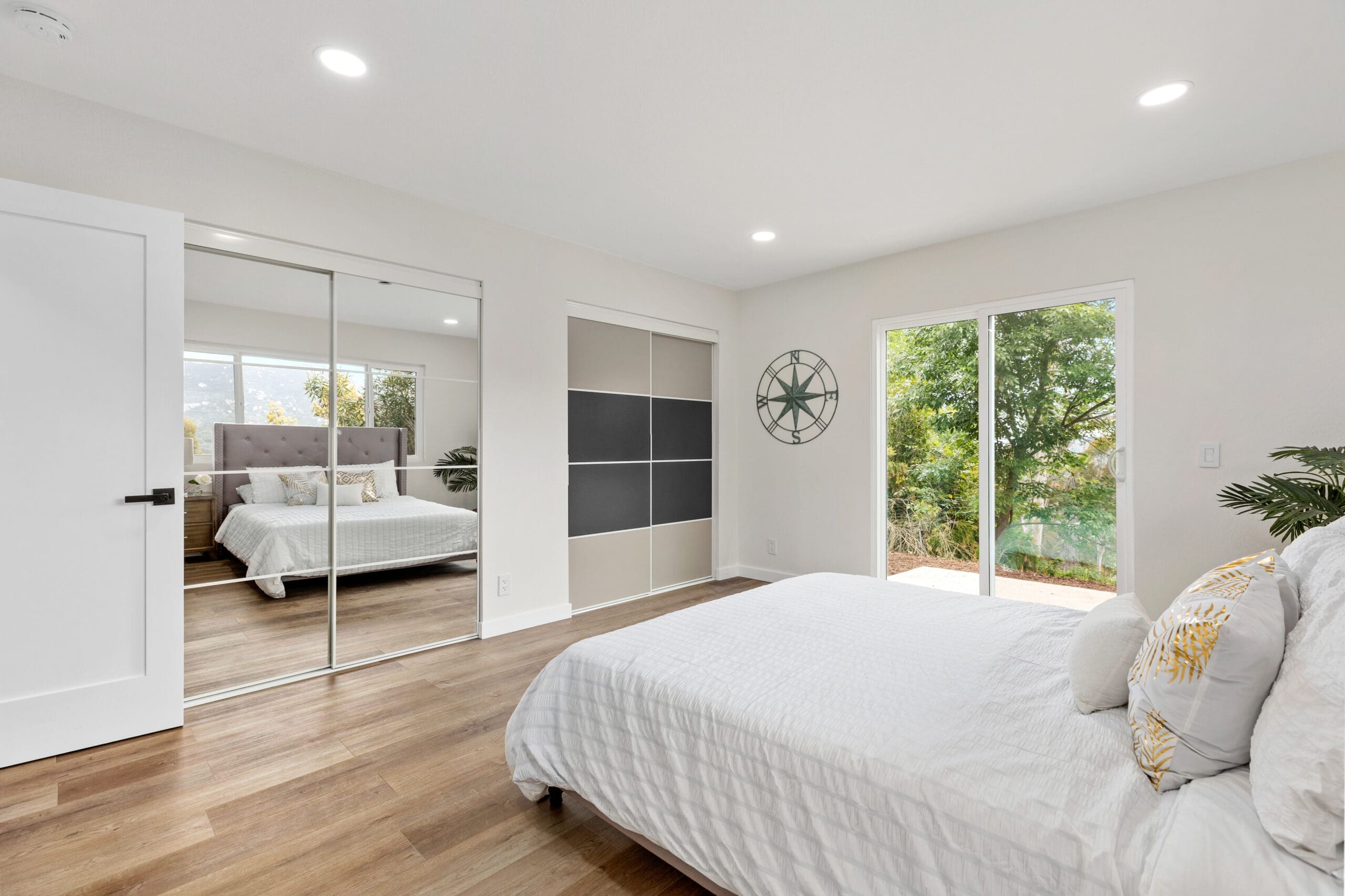 Modern ADU construction in San Diego with a stylish backyard.   Custom-built accessory dwelling unit (ADU) with energy-efficient design.   San Diego ADU builders working on a detached guest house.   Luxury home remodeling project in San Diego featuring a modern kitchen.   San Diego home renovation with upgraded interiors and open floor plan.   Bathroom remodel in San Diego with sleek tile and custom vanity.   New home construction project in San Diego with contemporary design.   Experienced San Diego construction team building a custom home.   High-quality residential construction site in San Diego.