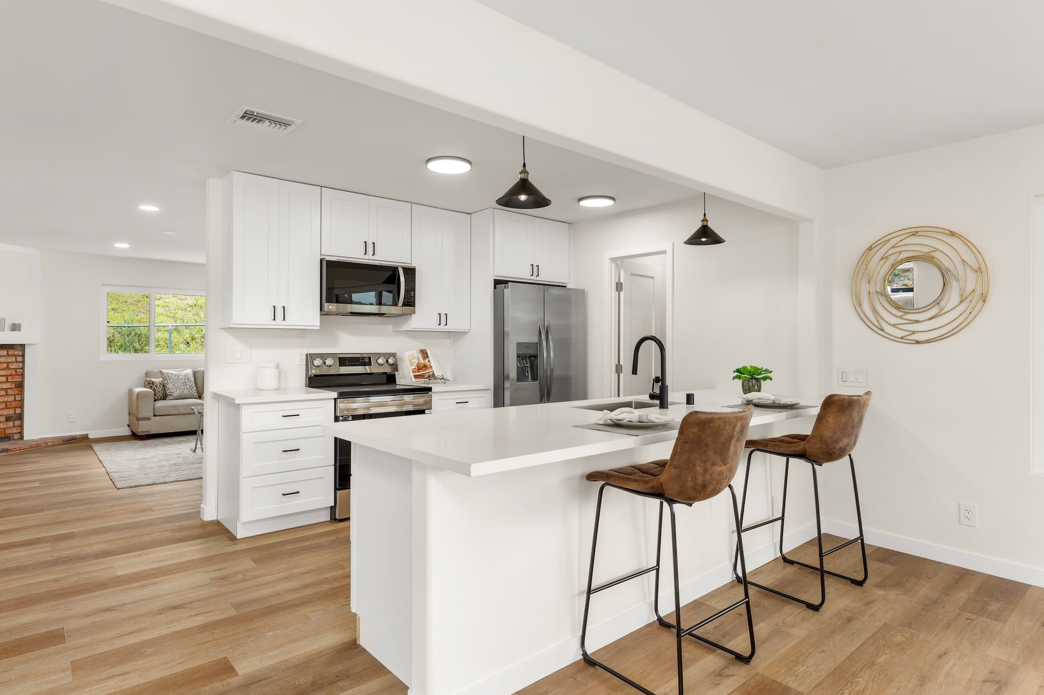 Modern ADU construction in San Diego with a stylish backyard.   Custom-built accessory dwelling unit (ADU) with energy-efficient design.   San Diego ADU builders working on a detached guest house.   Luxury home remodeling project in San Diego featuring a modern kitchen.   San Diego home renovation with upgraded interiors and open floor plan.   Bathroom remodel in San Diego with sleek tile and custom vanity.   New home construction project in San Diego with contemporary design.   Experienced San Diego construction team building a custom home.   High-quality residential construction site in San Diego.