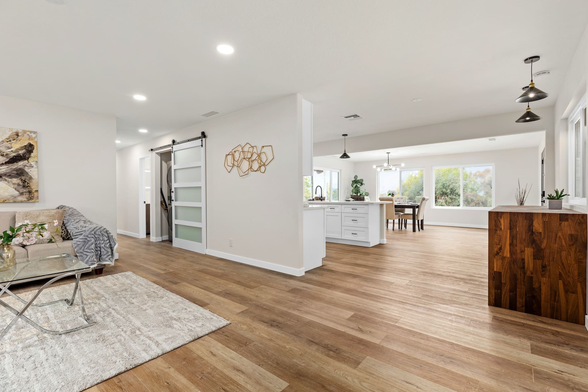 Modern ADU construction in San Diego with a stylish backyard.   Custom-built accessory dwelling unit (ADU) with energy-efficient design.   San Diego ADU builders working on a detached guest house.   Luxury home remodeling project in San Diego featuring a modern kitchen.   San Diego home renovation with upgraded interiors and open floor plan.   Bathroom remodel in San Diego with sleek tile and custom vanity.   New home construction project in San Diego with contemporary design.   Experienced San Diego construction team building a custom home.   High-quality residential construction site in San Diego.