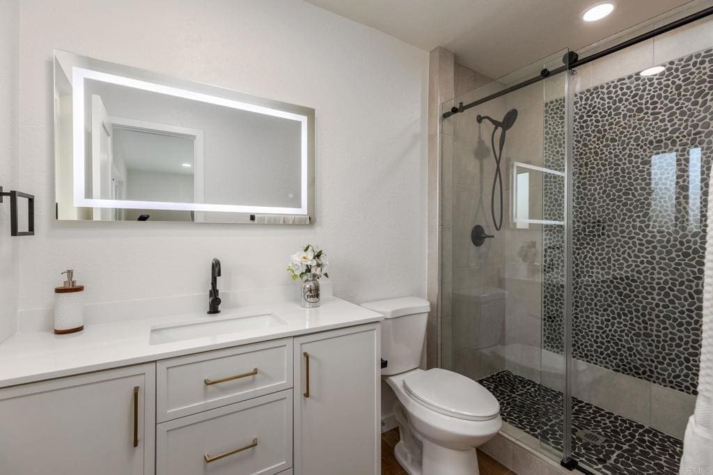 Modern ADU construction in San Diego with a stylish backyard.   Custom-built accessory dwelling unit (ADU) with energy-efficient design.   San Diego ADU builders working on a detached guest house.   Luxury home remodeling project in San Diego featuring a modern kitchen.   San Diego home renovation with upgraded interiors and open floor plan.   Bathroom remodel in San Diego with sleek tile and custom vanity.   New home construction project in San Diego with contemporary design.   Experienced San Diego construction team building a custom home.   High-quality residential construction site in San Diego.