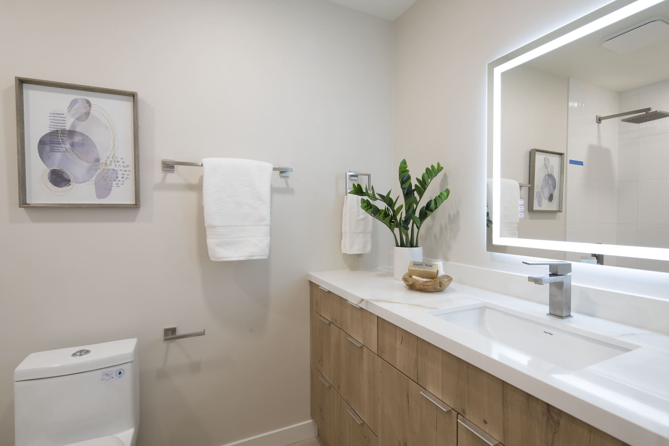 Modern ADU construction in San Diego with a stylish backyard.   Custom-built accessory dwelling unit (ADU) with energy-efficient design.   San Diego ADU builders working on a detached guest house.   Luxury home remodeling project in San Diego featuring a modern kitchen.   San Diego home renovation with upgraded interiors and open floor plan.   Bathroom remodel in San Diego with sleek tile and custom vanity.   New home construction project in San Diego with contemporary design.   Experienced San Diego construction team building a custom home.   High-quality residential construction site in San Diego.