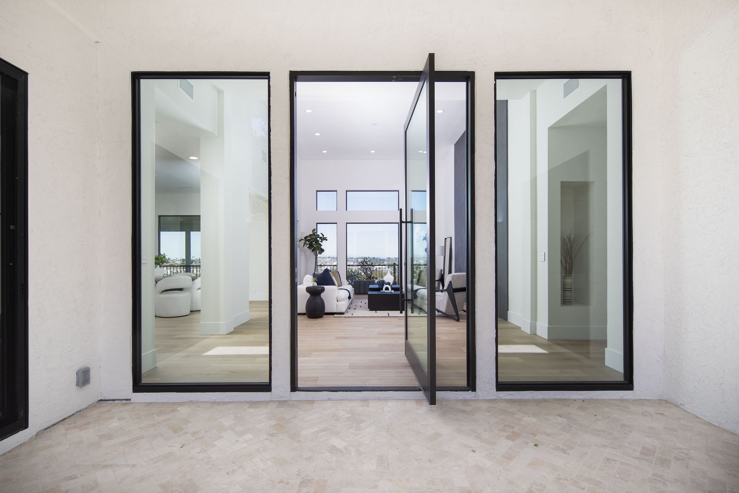 Modern ADU construction in San Diego with a stylish backyard.   Custom-built accessory dwelling unit (ADU) with energy-efficient design.   San Diego ADU builders working on a detached guest house.   Luxury home remodeling project in San Diego featuring a modern kitchen.   San Diego home renovation with upgraded interiors and open floor plan.   Bathroom remodel in San Diego with sleek tile and custom vanity.   New home construction project in San Diego with contemporary design.   Experienced San Diego construction team building a custom home.   High-quality residential construction site in San Diego.