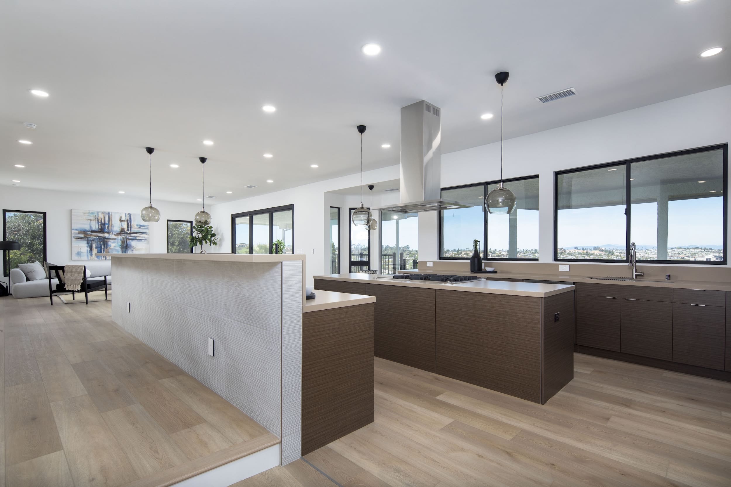 Modern ADU construction in San Diego with a stylish backyard.   Custom-built accessory dwelling unit (ADU) with energy-efficient design.   San Diego ADU builders working on a detached guest house.   Luxury home remodeling project in San Diego featuring a modern kitchen.   San Diego home renovation with upgraded interiors and open floor plan.   Bathroom remodel in San Diego with sleek tile and custom vanity.   New home construction project in San Diego with contemporary design.   Experienced San Diego construction team building a custom home.   High-quality residential construction site in San Diego.