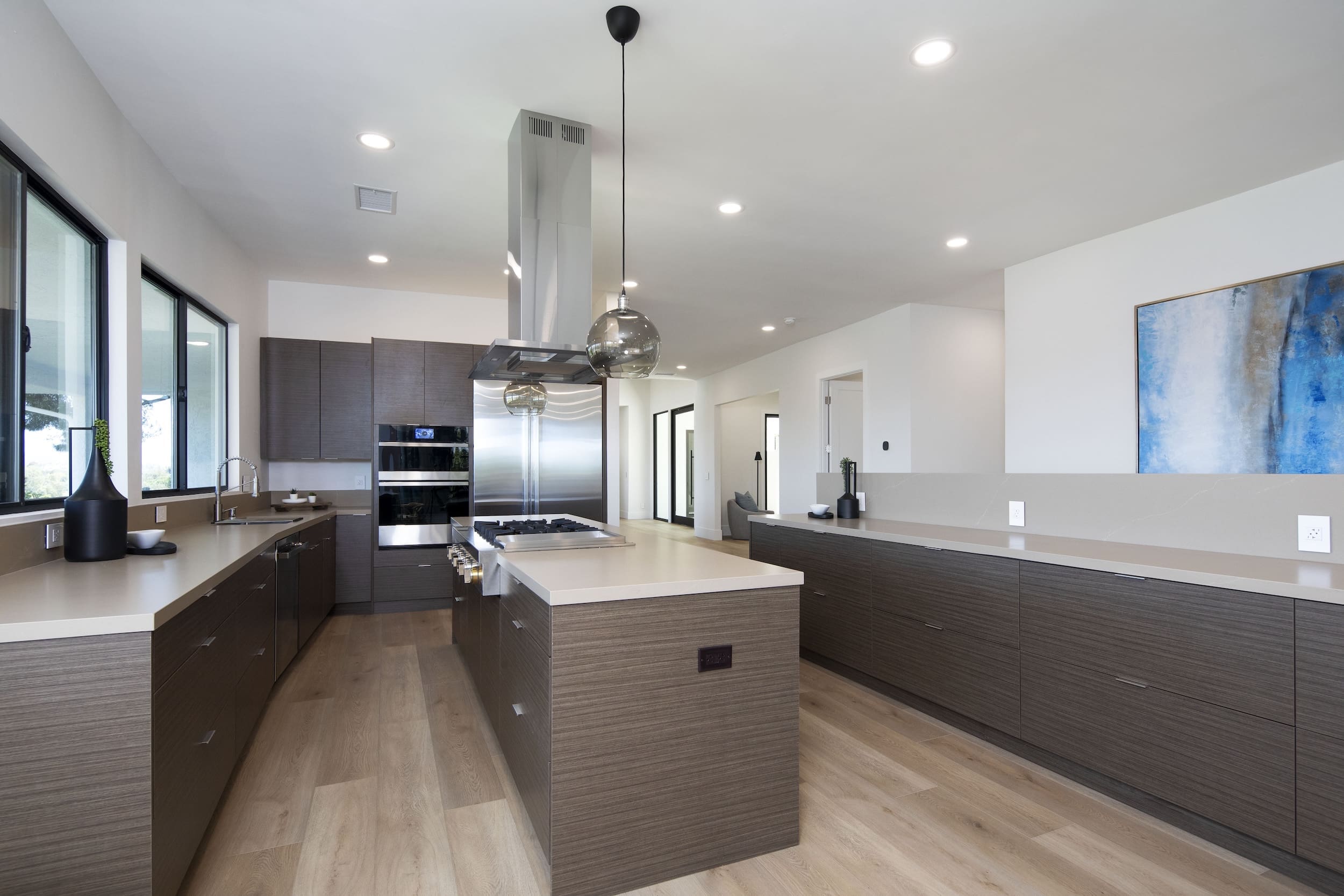 Modern ADU construction in San Diego with a stylish backyard.   Custom-built accessory dwelling unit (ADU) with energy-efficient design.   San Diego ADU builders working on a detached guest house.   Luxury home remodeling project in San Diego featuring a modern kitchen.   San Diego home renovation with upgraded interiors and open floor plan.   Bathroom remodel in San Diego with sleek tile and custom vanity.   New home construction project in San Diego with contemporary design.   Experienced San Diego construction team building a custom home.   High-quality residential construction site in San Diego.