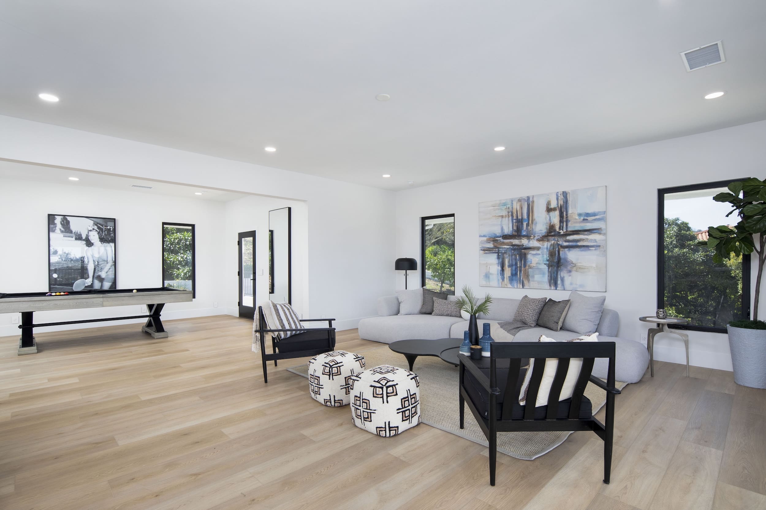 Modern ADU construction in San Diego with a stylish backyard.   Custom-built accessory dwelling unit (ADU) with energy-efficient design.   San Diego ADU builders working on a detached guest house.   Luxury home remodeling project in San Diego featuring a modern kitchen.   San Diego home renovation with upgraded interiors and open floor plan.   Bathroom remodel in San Diego with sleek tile and custom vanity.   New home construction project in San Diego with contemporary design.   Experienced San Diego construction team building a custom home.   High-quality residential construction site in San Diego.