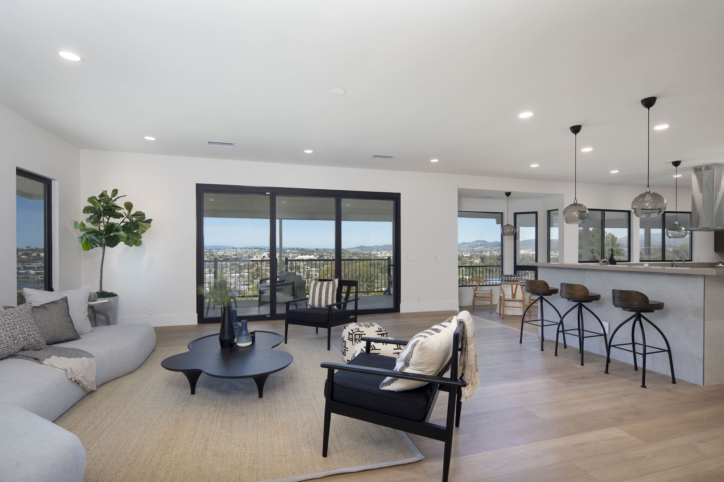 Modern ADU construction in San Diego with a stylish backyard.   Custom-built accessory dwelling unit (ADU) with energy-efficient design.   San Diego ADU builders working on a detached guest house.   Luxury home remodeling project in San Diego featuring a modern kitchen.   San Diego home renovation with upgraded interiors and open floor plan.   Bathroom remodel in San Diego with sleek tile and custom vanity.   New home construction project in San Diego with contemporary design.   Experienced San Diego construction team building a custom home.   High-quality residential construction site in San Diego.