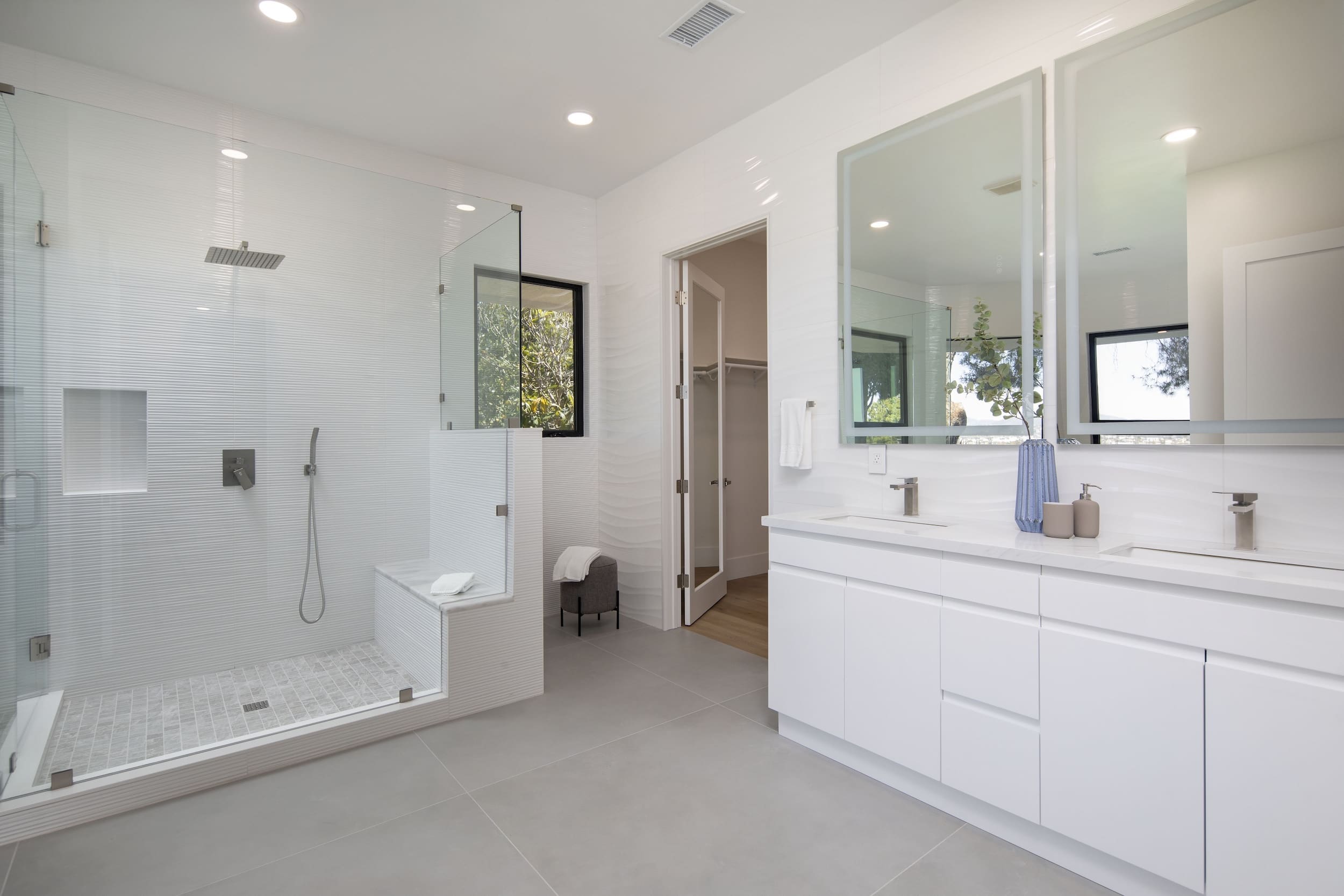 Modern ADU construction in San Diego with a stylish backyard.   Custom-built accessory dwelling unit (ADU) with energy-efficient design.   San Diego ADU builders working on a detached guest house.   Luxury home remodeling project in San Diego featuring a modern kitchen.   San Diego home renovation with upgraded interiors and open floor plan.   Bathroom remodel in San Diego with sleek tile and custom vanity.   New home construction project in San Diego with contemporary design.   Experienced San Diego construction team building a custom home.   High-quality residential construction site in San Diego.