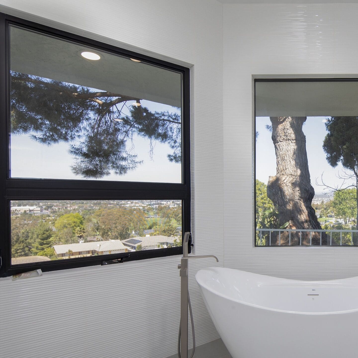 Modern ADU construction in San Diego with a stylish backyard.   Custom-built accessory dwelling unit (ADU) with energy-efficient design.   San Diego ADU builders working on a detached guest house.   Luxury home remodeling project in San Diego featuring a modern kitchen.   San Diego home renovation with upgraded interiors and open floor plan.   Bathroom remodel in San Diego with sleek tile and custom vanity.   New home construction project in San Diego with contemporary design.   Experienced San Diego construction team building a custom home.   High-quality residential construction site in San Diego.