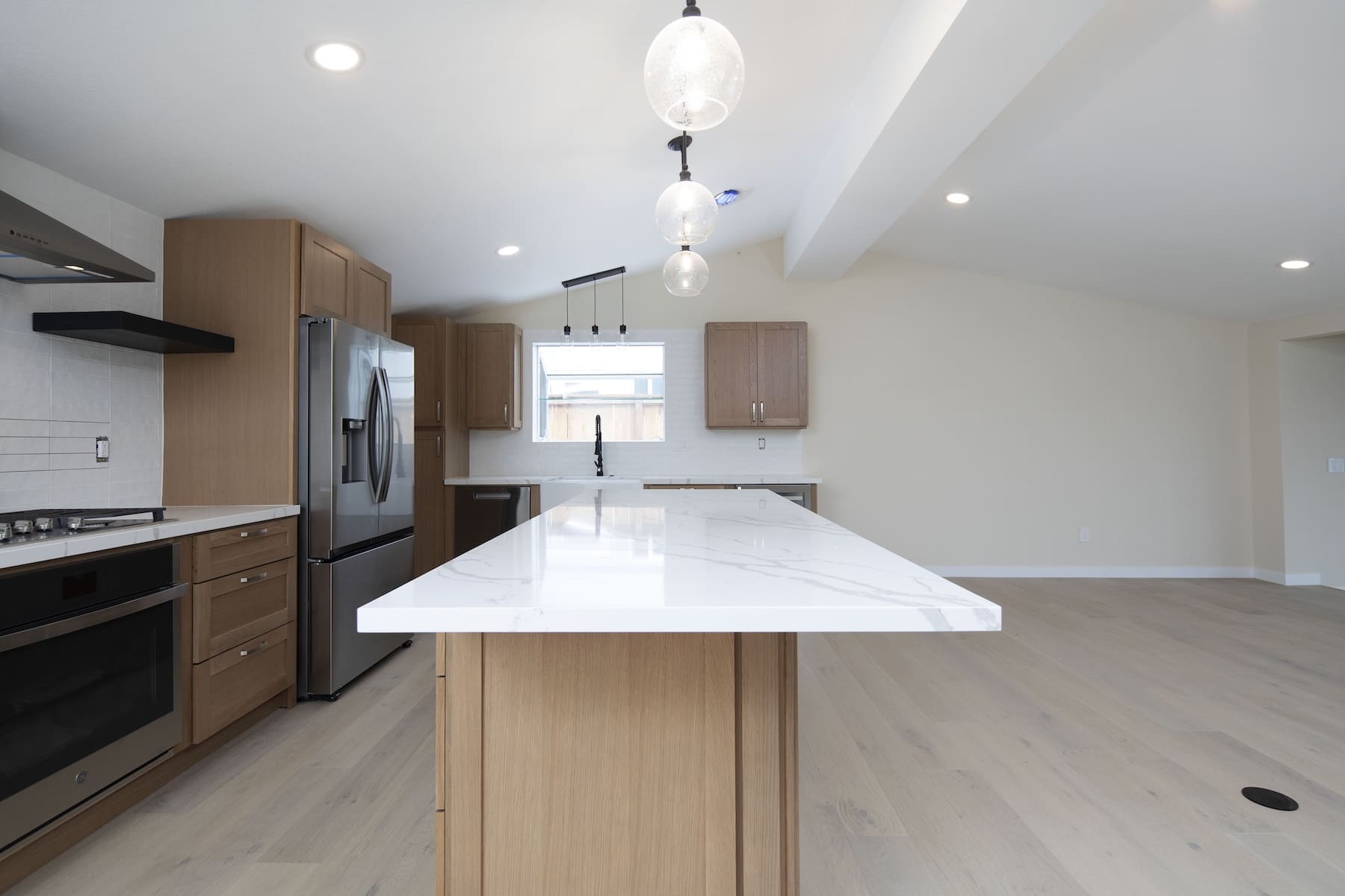 a kitchen with a white countertop