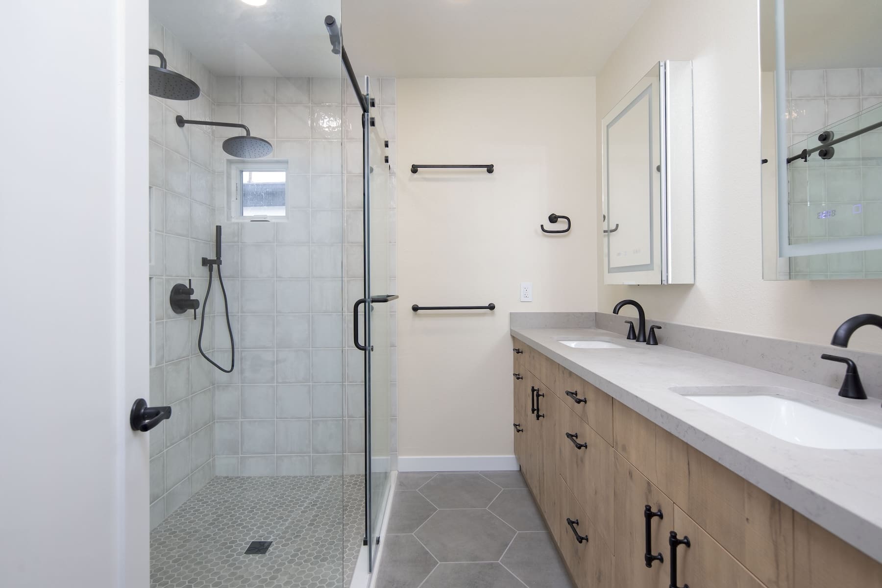 a bathroom with a shower and sink